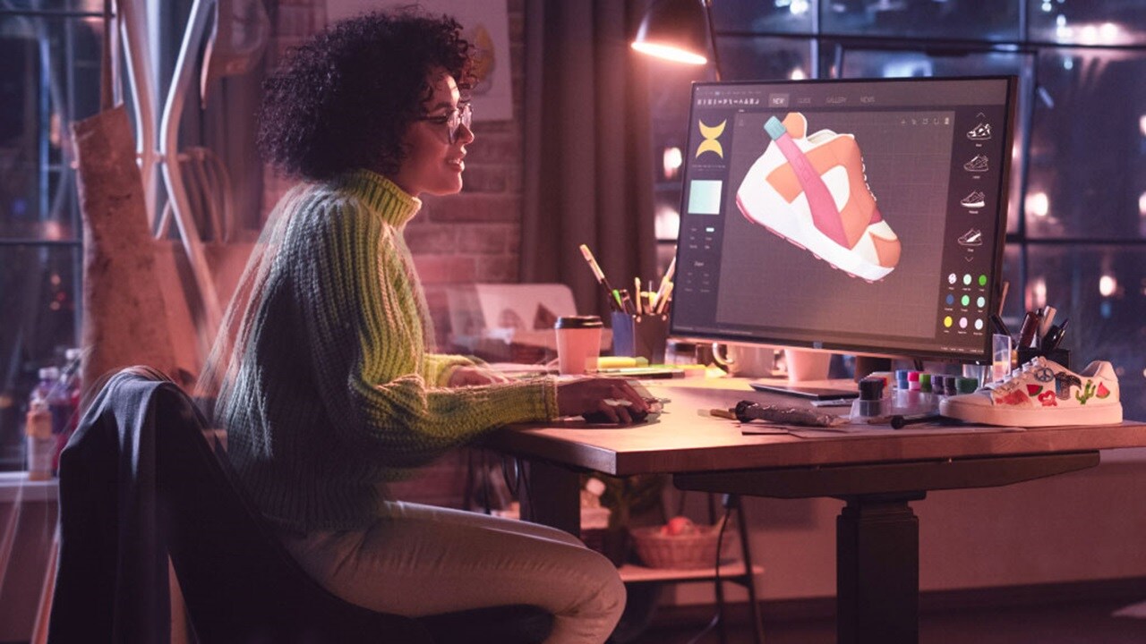 Woman designing in desktop