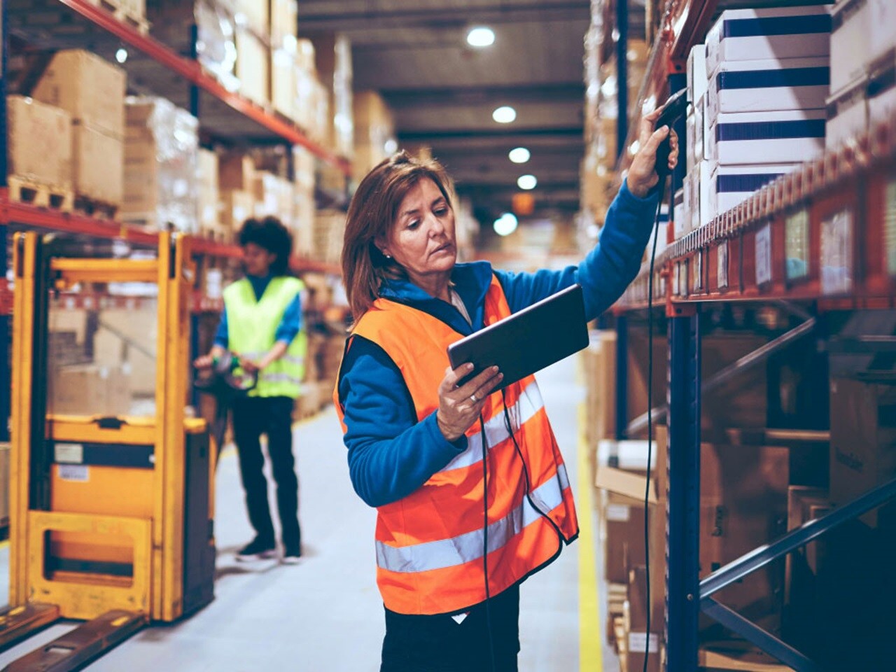 Two females in a warehouse