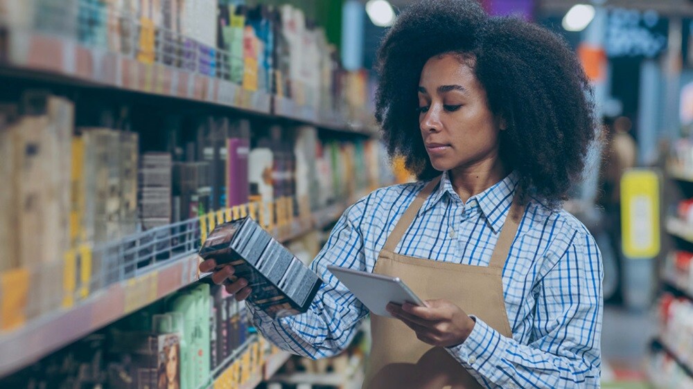 Female looking at a product in a mart