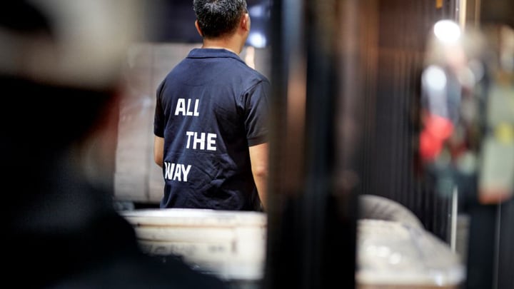 Emplyee wearing all the way t-shirt