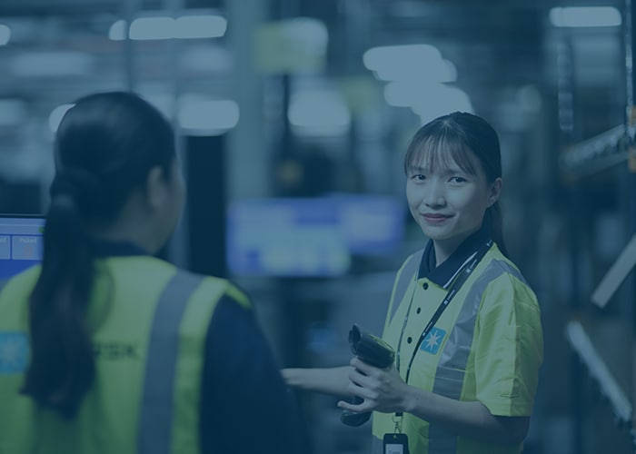 Women employees working inside warehouse