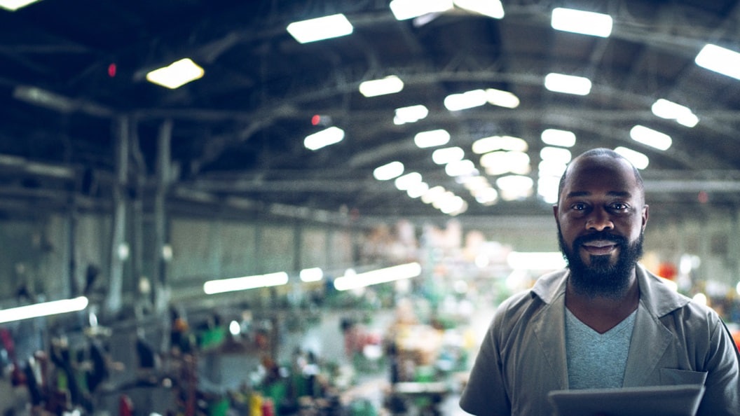 man standing in a warehousing