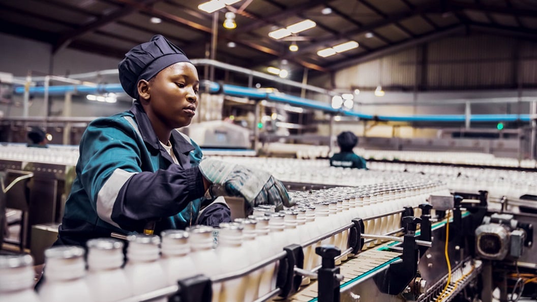 Female Production Line Worker at a Dairy Factory in Africa