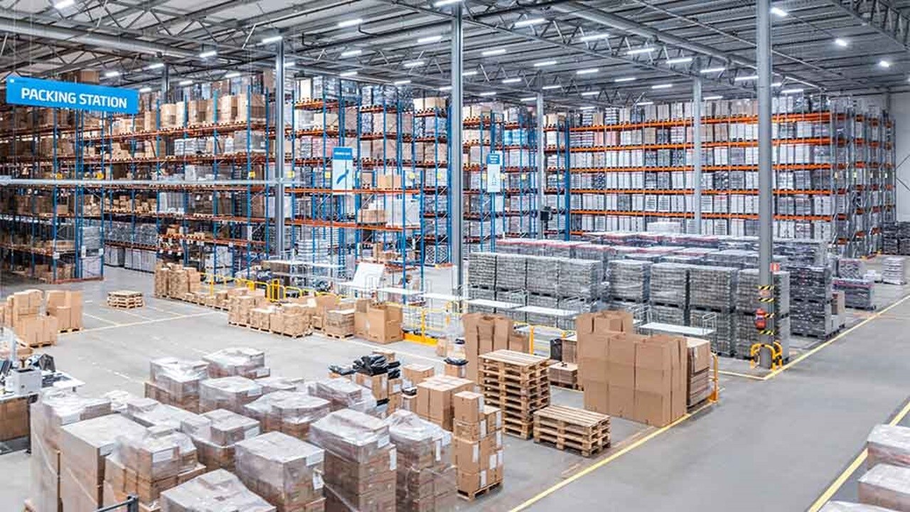 A vast warehouse with an abundance of boxes and shelves, highlighting a well-stocked inventory space.