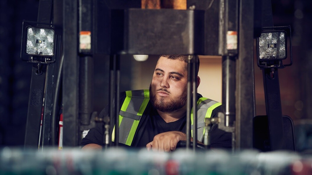 Warehouse employee moves goods