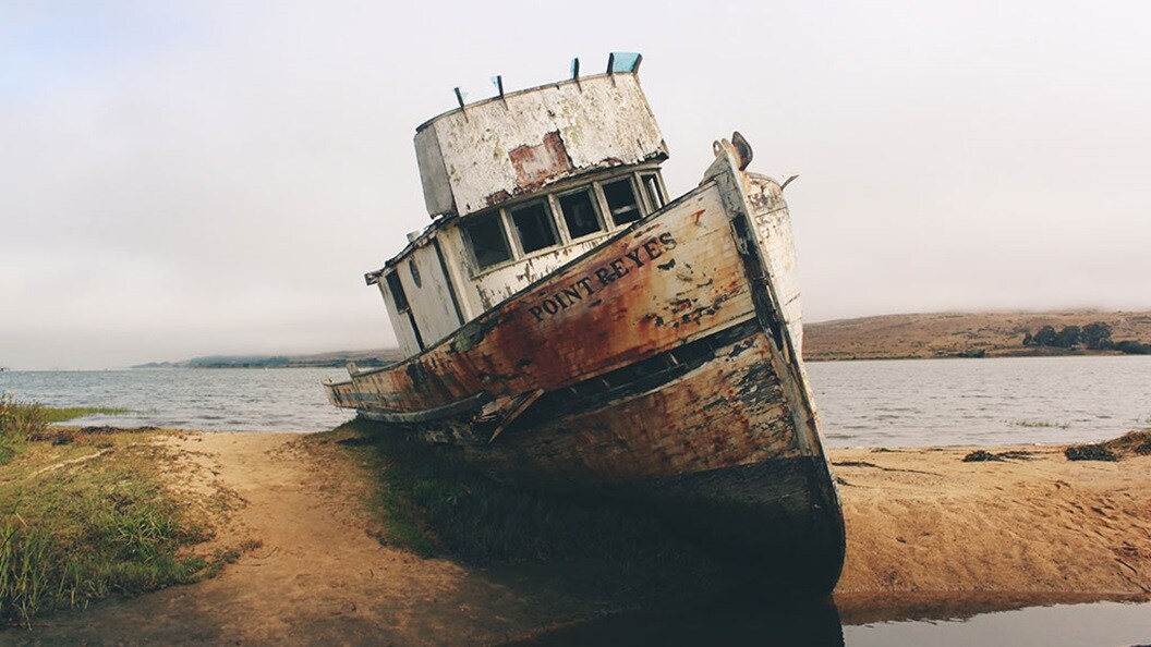 Boat stranded on riverbank during low water levels