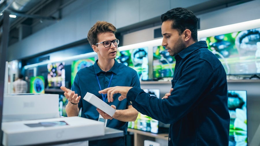 Two men in an electronics store