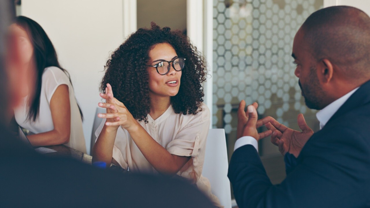 Two people discussing customs services