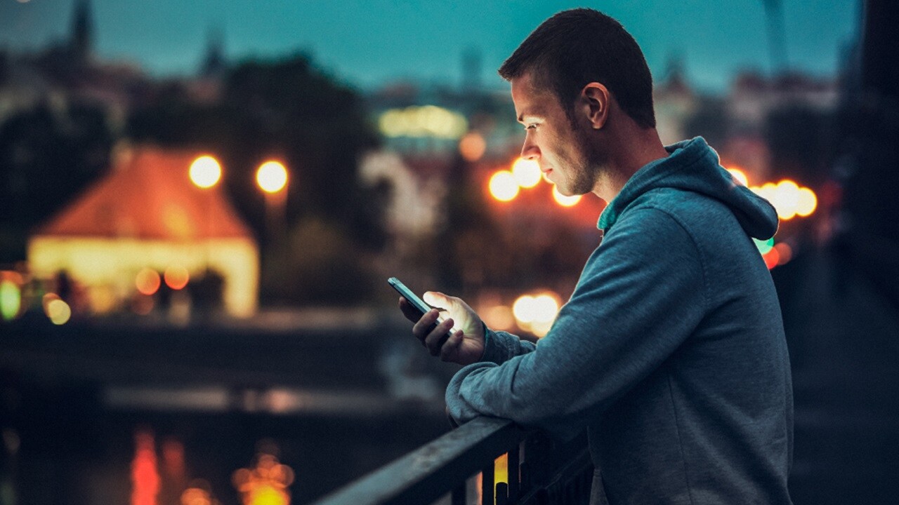Male looking into his phone