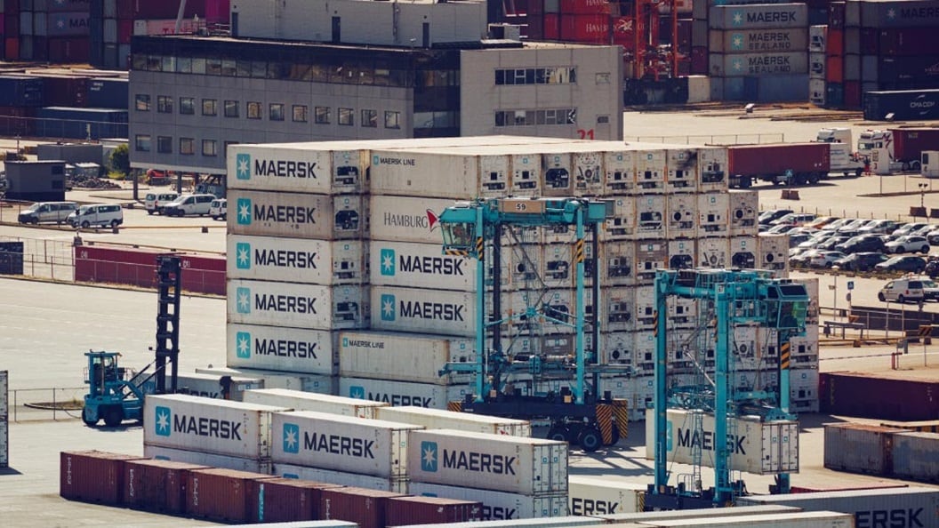 Stacked Maersk containers at port