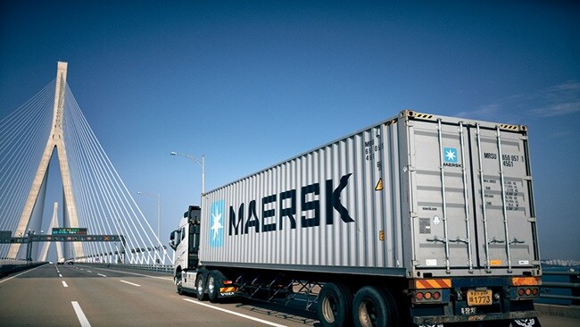 Truck with Maersk container driving in Seoul