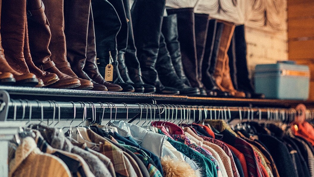 A display of apparel and related accessories in a store.