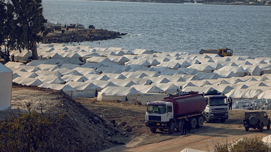 Trucks departing after the aid and relief supplies were unloaded at the cargo storage place.