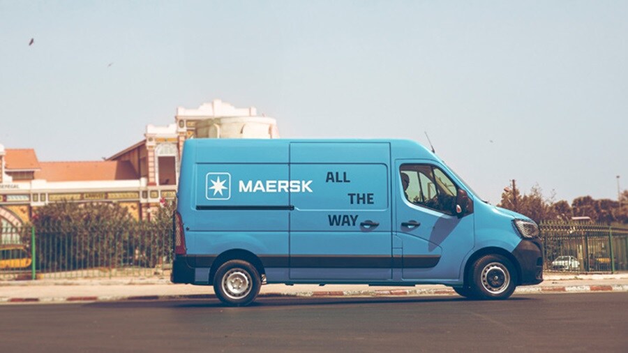 Maersk van in blue color with all the way slogan