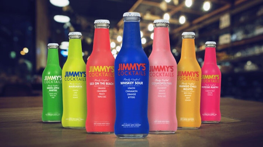 glass bottles filled with liquid juice