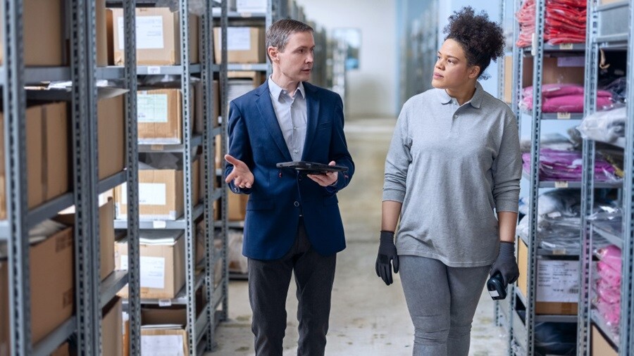 Business partners working together at the warehouse