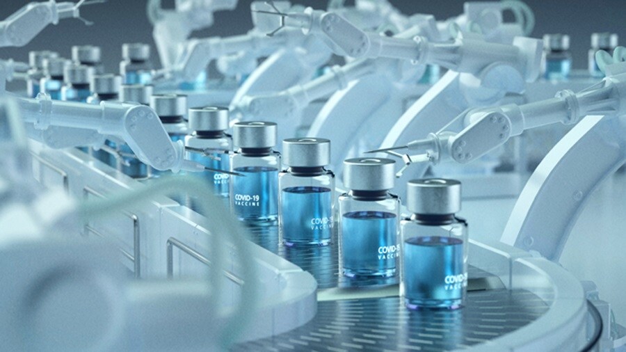 Vaccines on conveyor belt at a manufacturing location