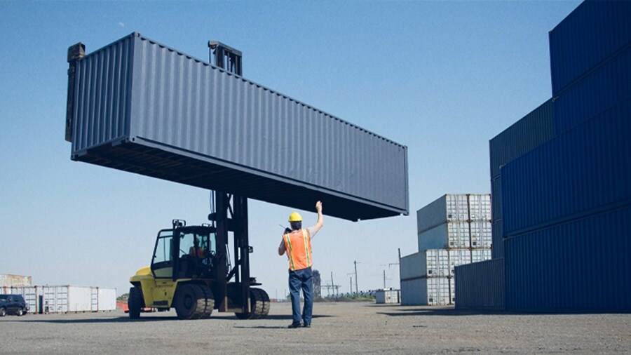 A container being transferred at the dock 