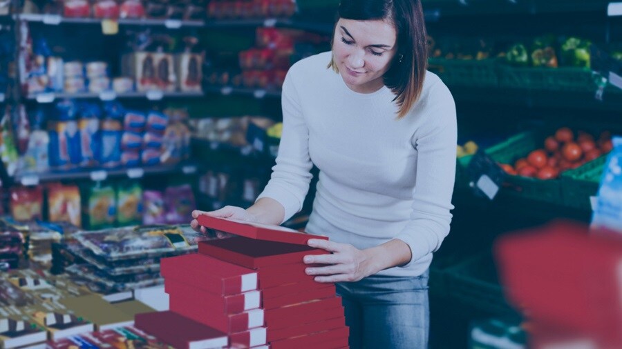 Woman boxing chocolates