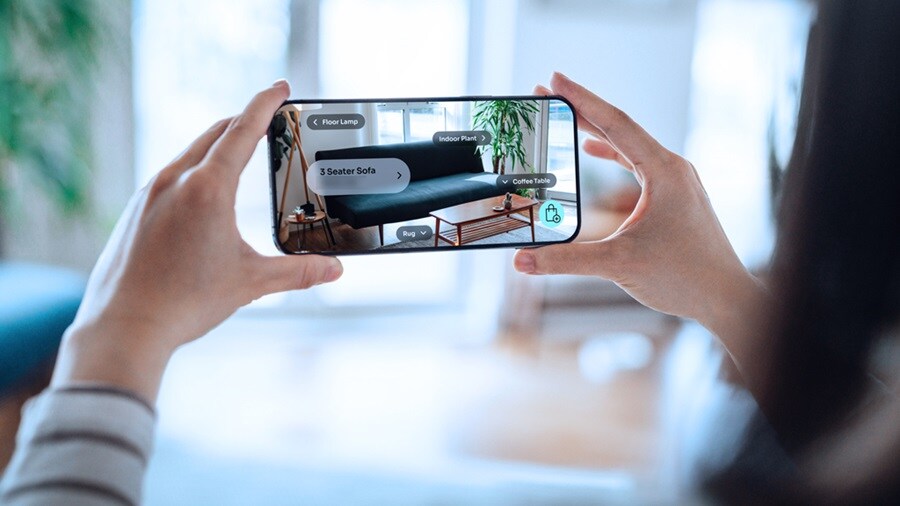 Woman snapping picture from the mobile phone 