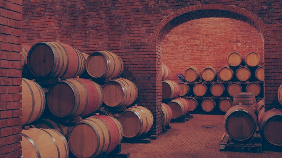 Barrels of wine stored in cellar