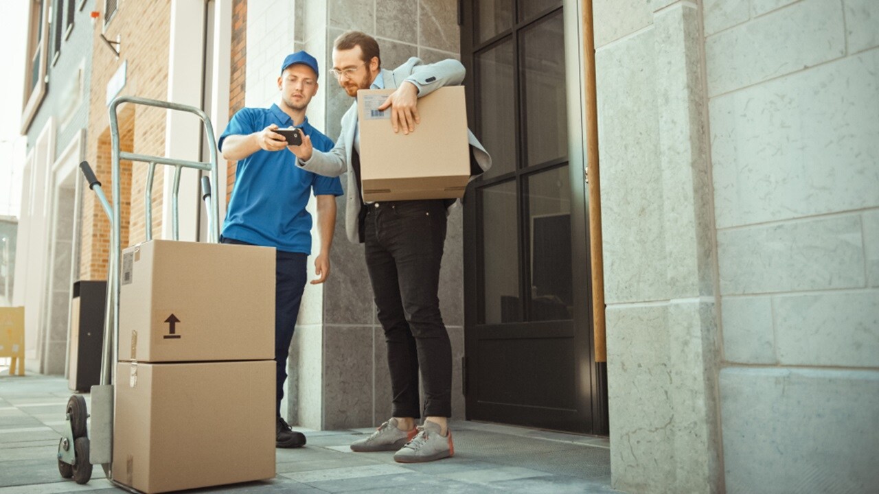 Man delivering a shipment to another man