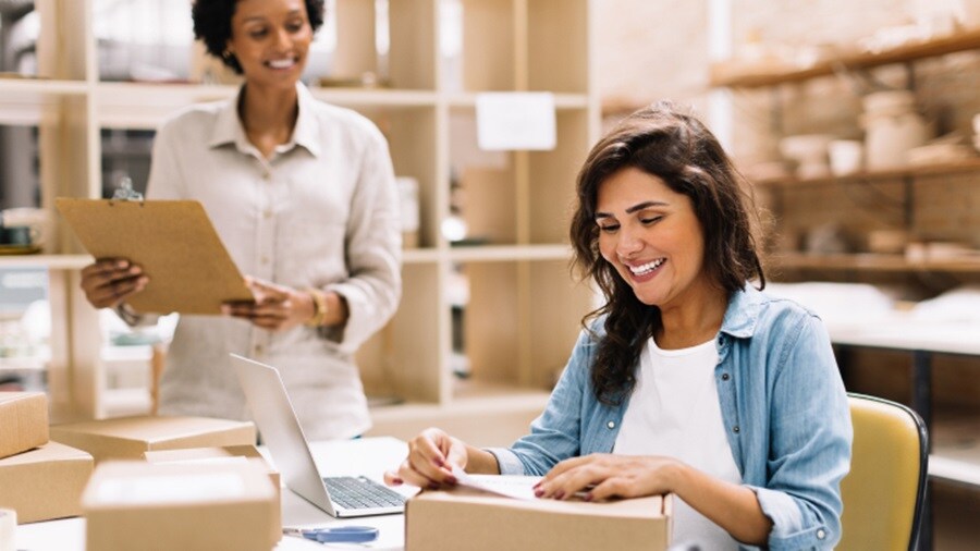 Two female working in an office
