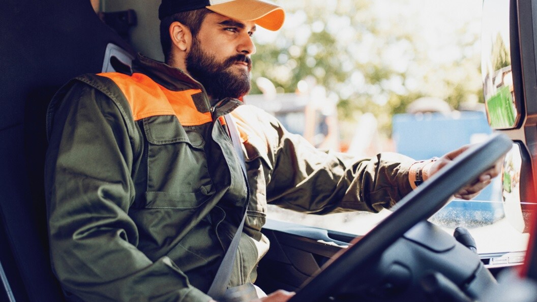 Male driving a truck