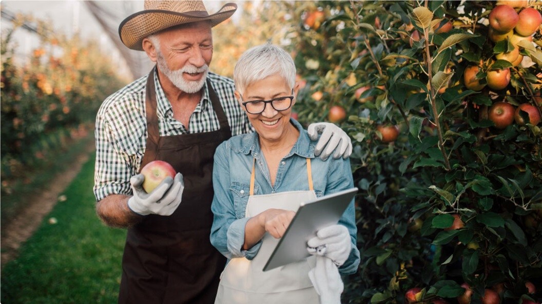 Man and Women in apple farm