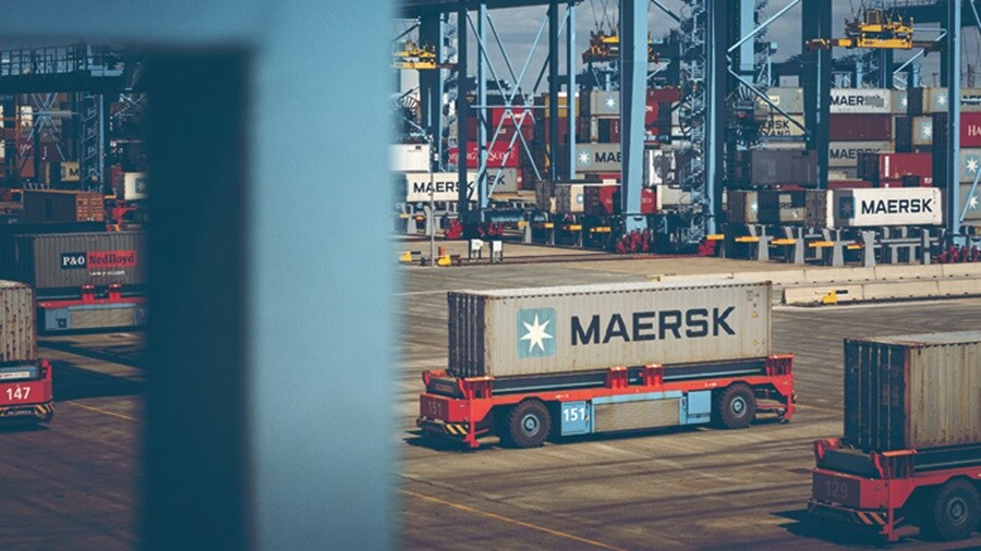 Maersk containers in a dockyard.