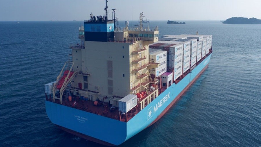 Maersk vessel with a lot of containers in an ocean