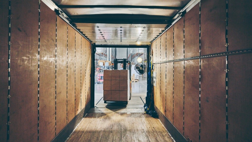 Male unloading shipments using a forklift