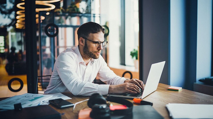 man working on laptop