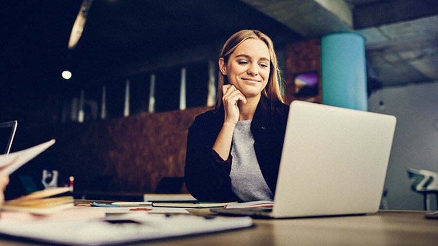 women looking at laptop