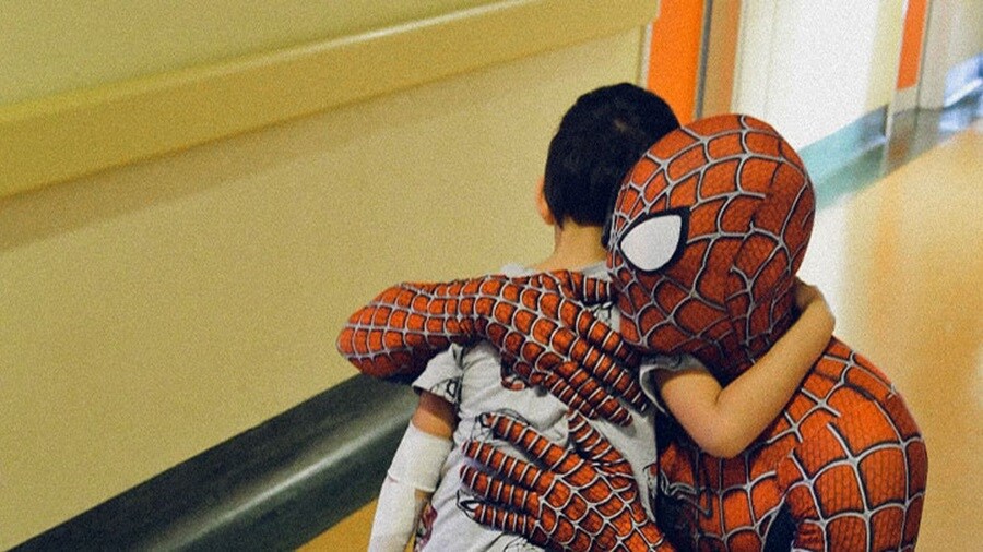 Mattia Villardita hugging kid