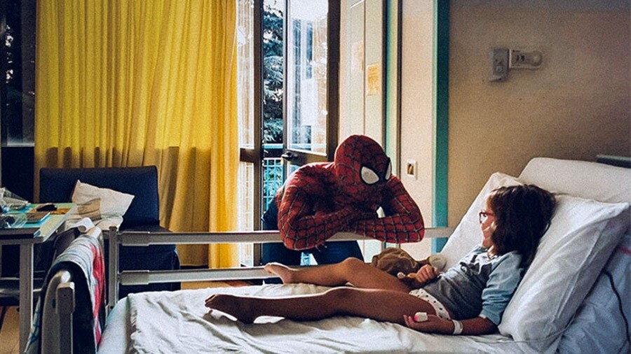 Mattia Villardita with kid in bed