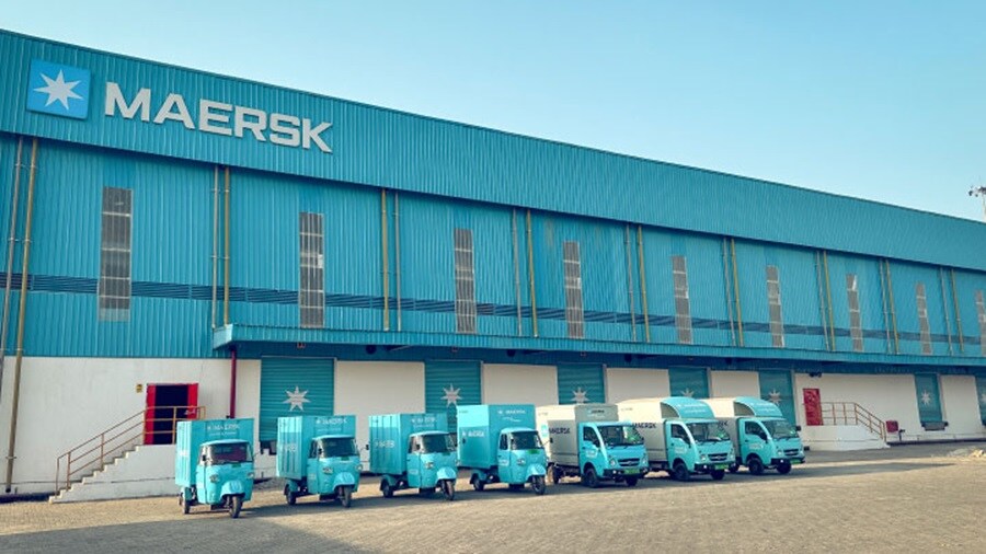 Maersk trucks parked outside a warehouse