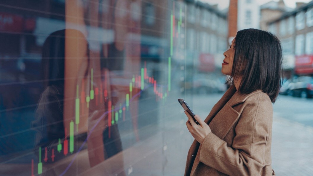 Picture of a woman looking at glass screen
