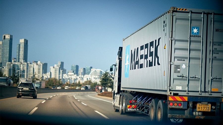 Truck with Maersk container driving in Seoul