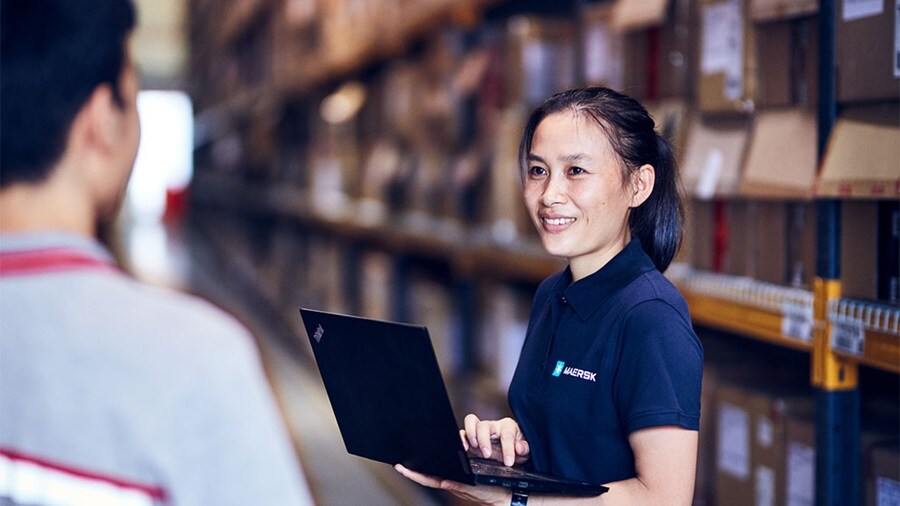 Parcel delivery warehouse in a European city, emphasizing new regulations on parcel space efficiency.