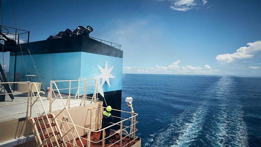 Container ship navigating through the Red Sea, highlighting the increased transit times due to diversions