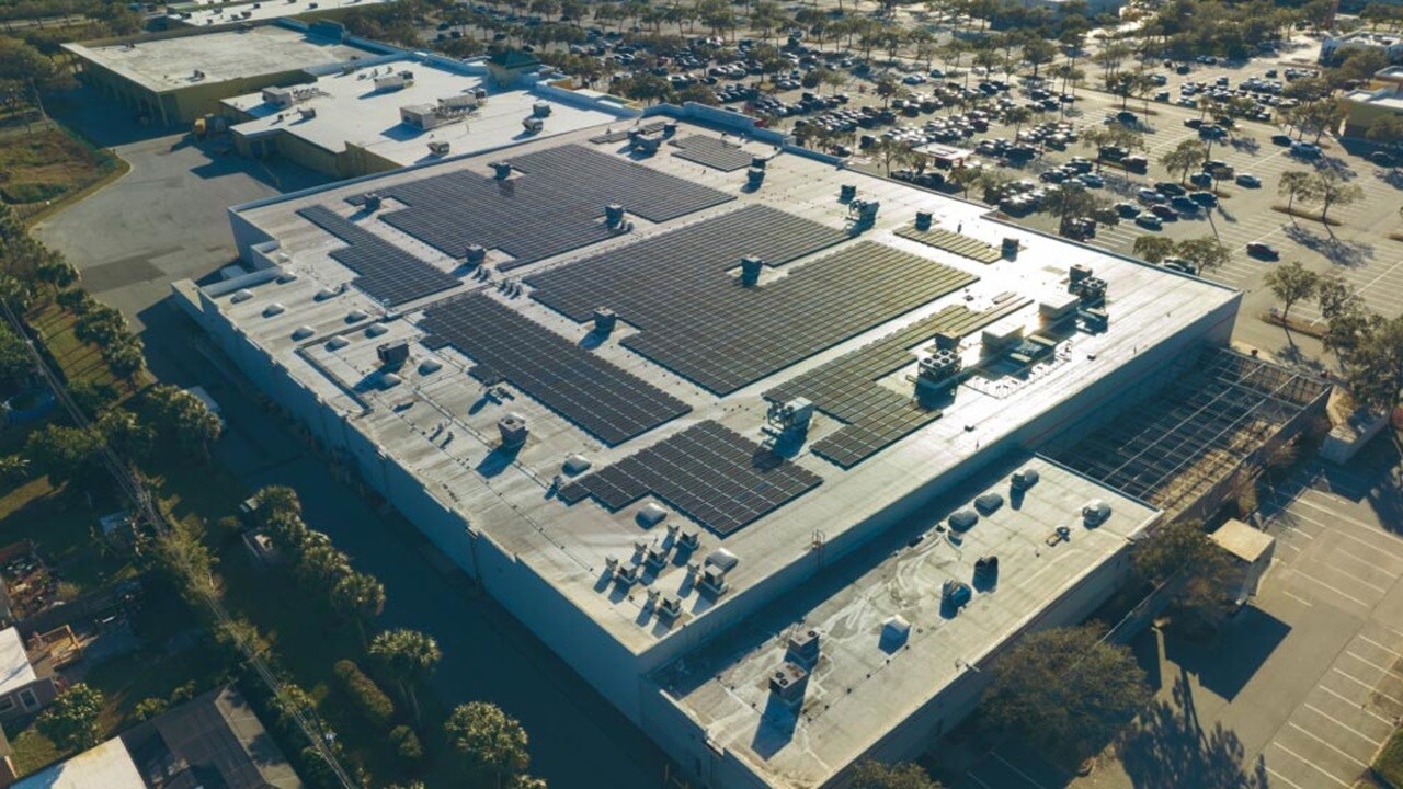 Overview shot of Maersk warehouse with Solar panels on rooftop.