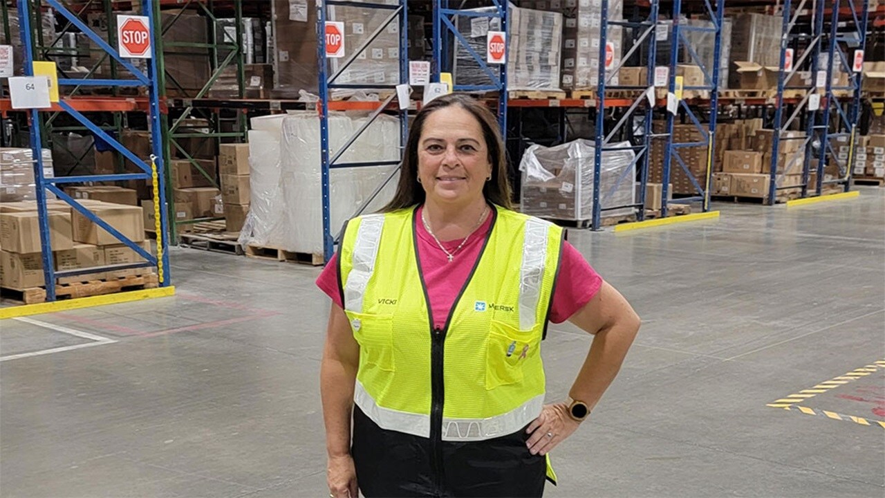 Vicki in a yellow vest.