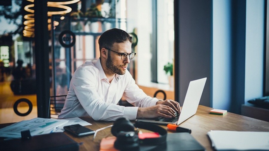 man working in laptop