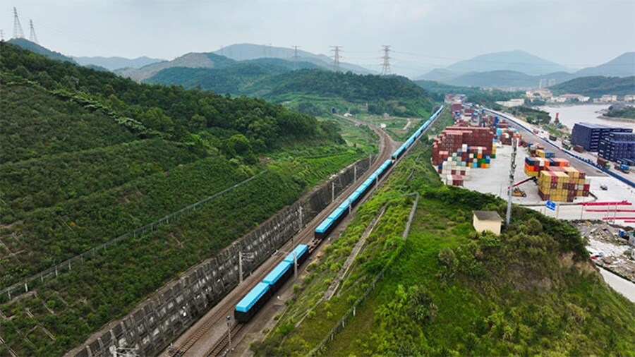 Freight train transporting Maersk containers.