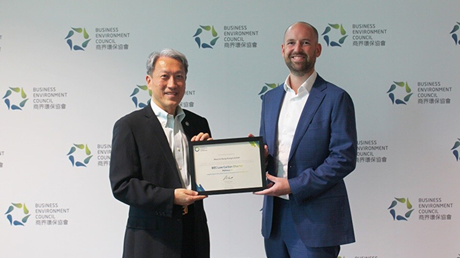 Mr. Daan Slotema, Head of Legal, Maersk Asia Pacific (right) received the certificate from Mr. Adam Koo, CEO of Business Environment Council, Hong Kong (left)