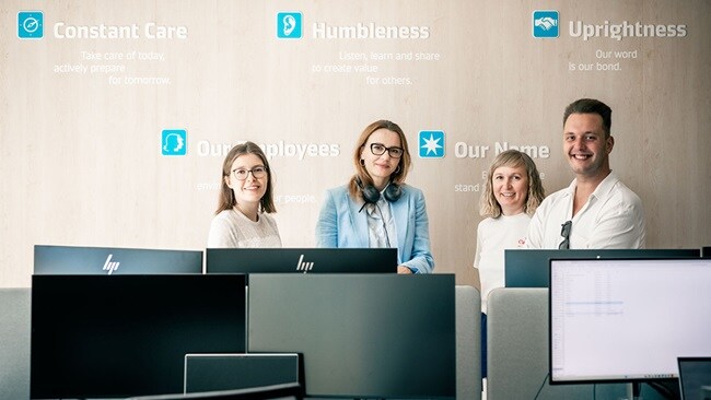 Maersk employees in a meeting