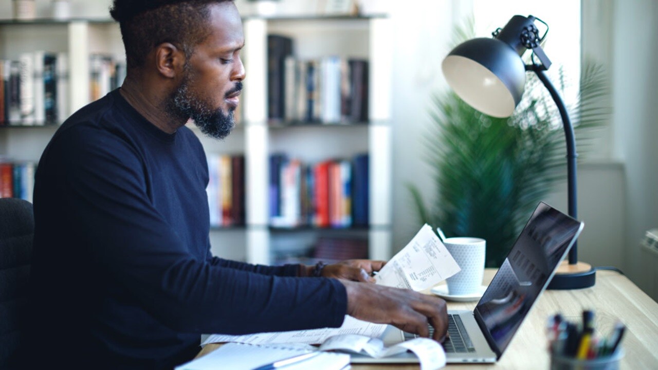man accessing the laptop